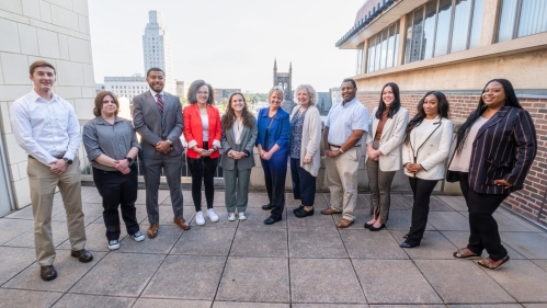  Pro bono and public interest students standing on patio