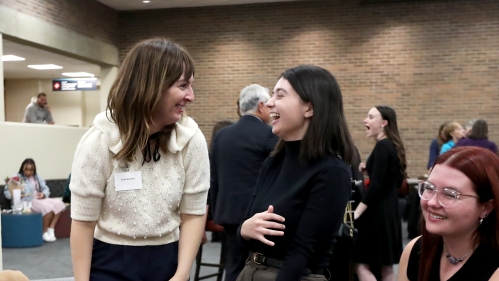Women talking and laughing
