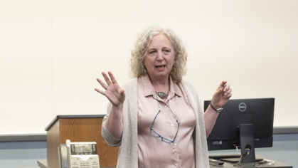 woman in front of class