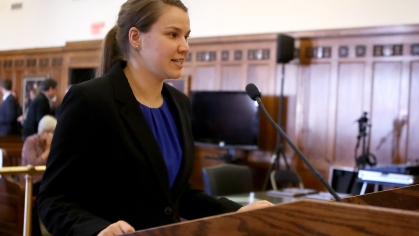 Student at mic in courtroom