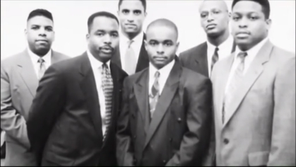 Black and white image of male students in the 60s