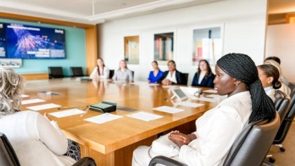 group of people sitting around a table