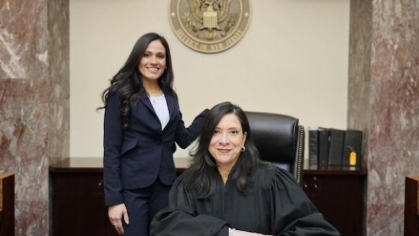 two women posing for a photograph