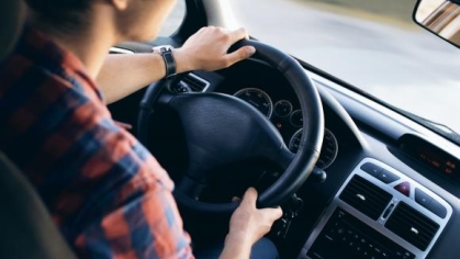 person driving a car