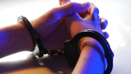 picture of hands in handcuffs