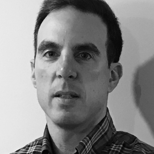 a man with a serious face