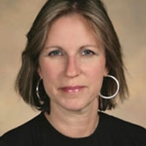 a woman with a serious face