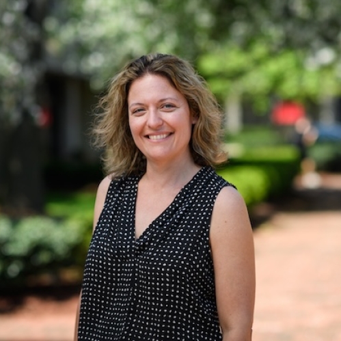 woman smiling outside