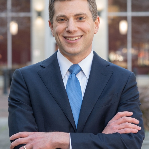 man in suit smiling
