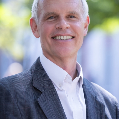 man outside smiling