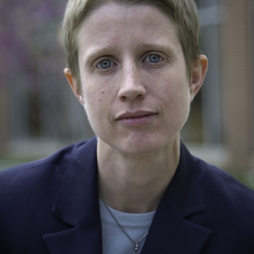 woman looking straight ahead seriously