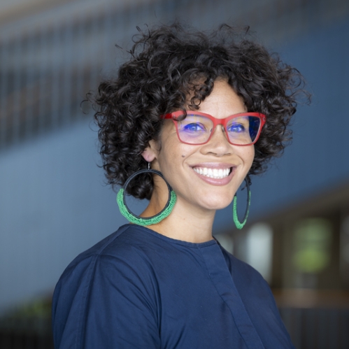woman in glasses smiling