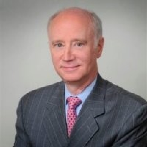 man in gray suit and pink tie