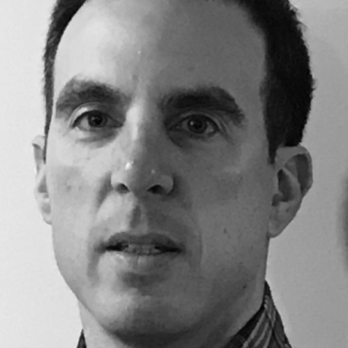 Photo of a man in black and white.