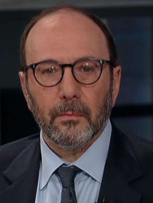 a man with a beard and glasses