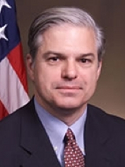 a man with a serious face
