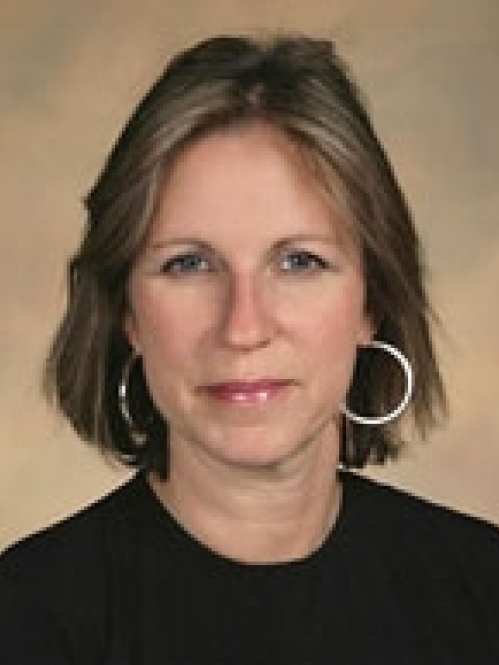 a woman with a serious face