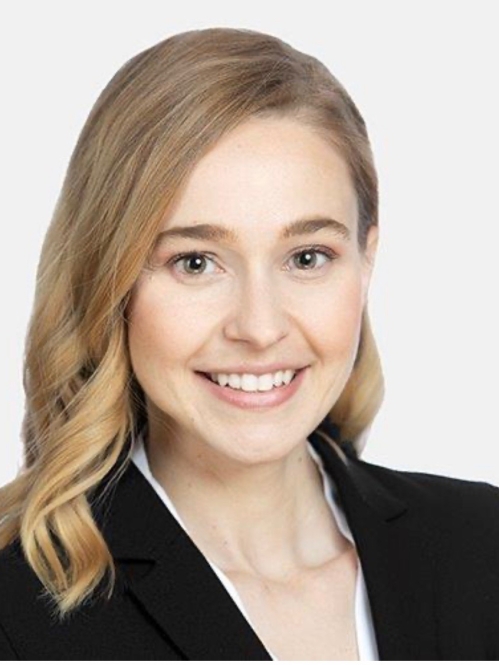 A blonde woman smiling