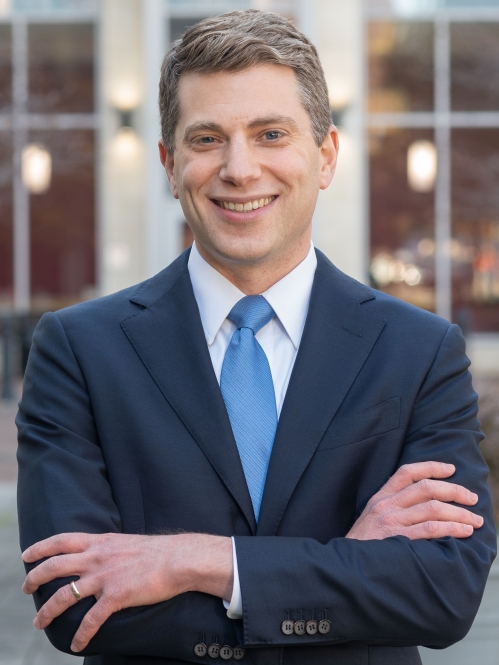 man in suit smiling