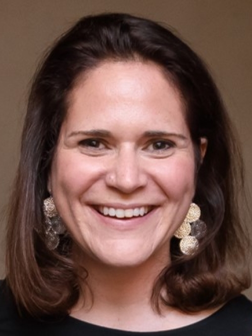 Woman grinning wearing black shirt