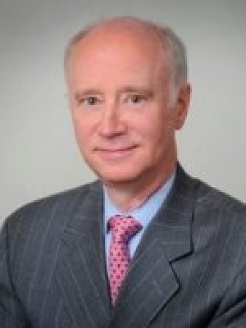 man in gray suit and pink tie