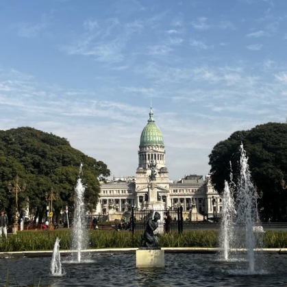 picture of a classical government building with a green dome