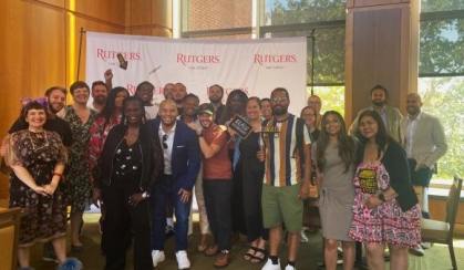 Group of people posing for a photograph