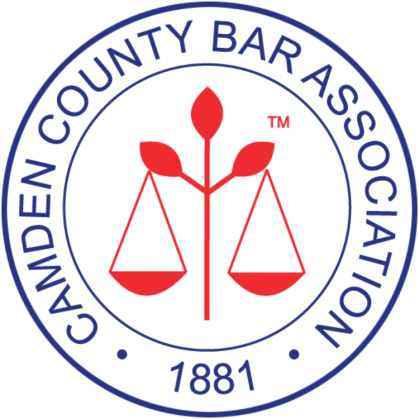 Circular logo with scales in the middle and text that reads 'Camden County Bar Association 1881'