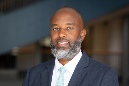 man smiling in business suit