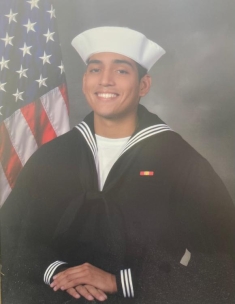 man in a military outfit posing for a photograph
