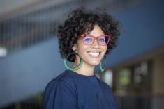 woman in glasses smiling