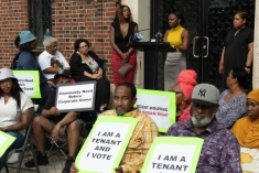 People holding signs