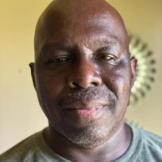 man posing for a photograph