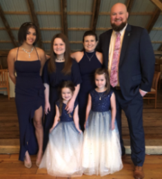 family posing for a photograph