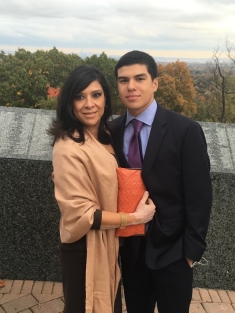 Woman and man standing next to each other and smiling