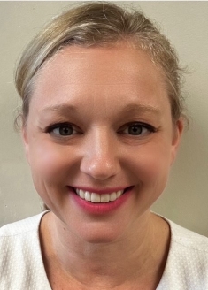 close headshot of blonde woman