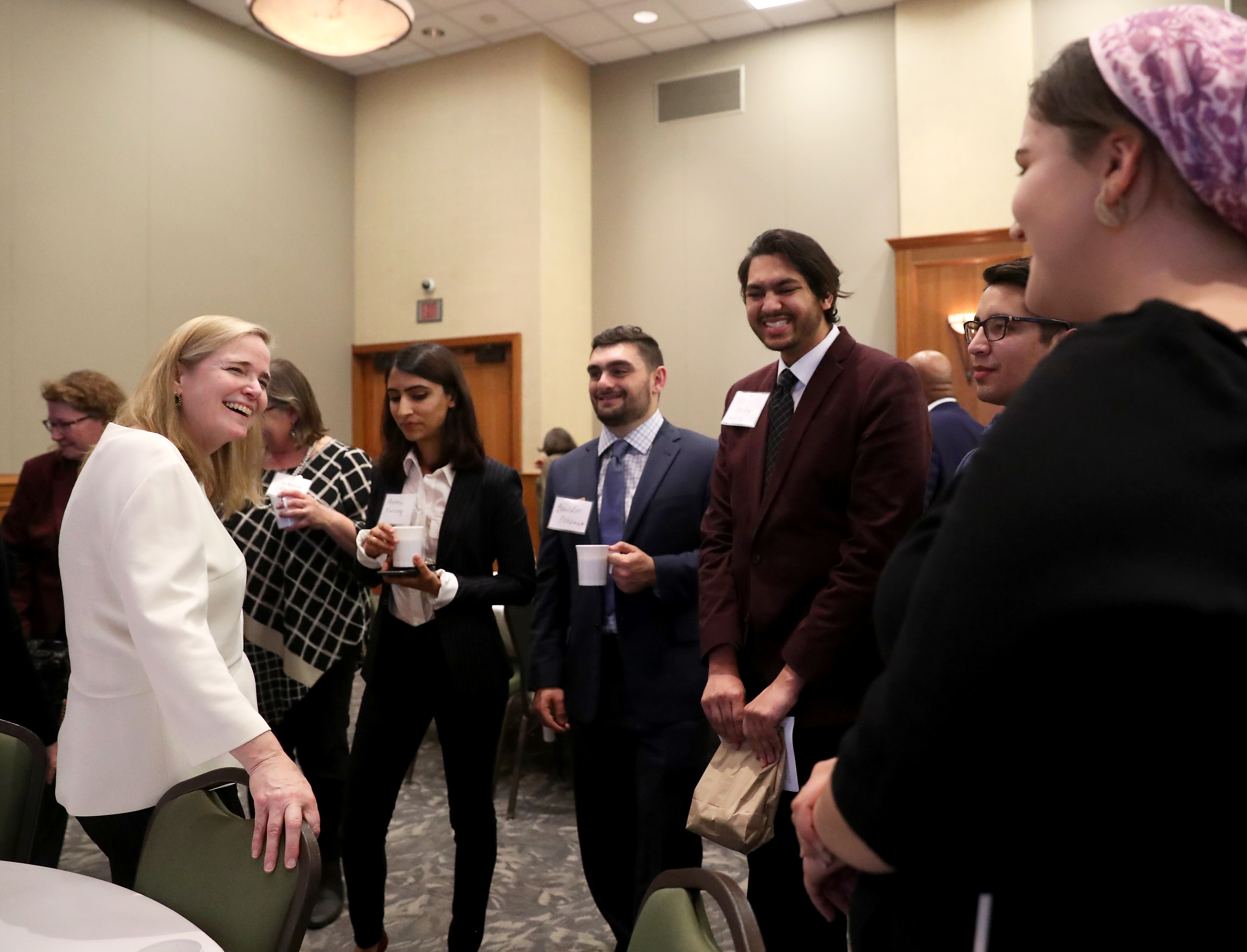 Honoree Susan L. Burke talks with Rutgers Law students.