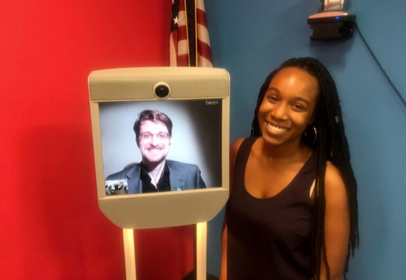 Morgan Humphrey at the ACLU photographed with Edward Snowden on a telepresence robot.